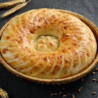 Лепёшка тандырная узбекская в Мангалоff по цене 100 ₽