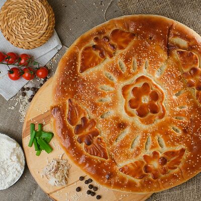 Пирог с куриной грудкой в сливочном соусе в Пироги по-коми по цене 2099 ₽
