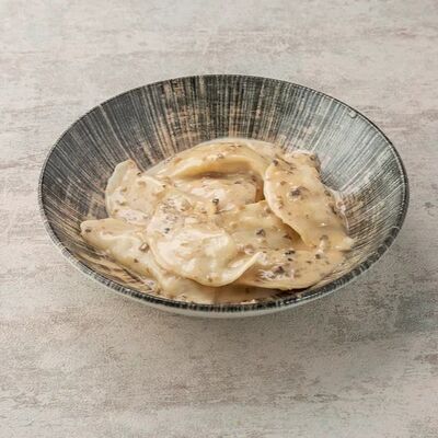 Вареники с картофелем и луком в сливочно-грибном соусе в Или по цене 290 ₽
