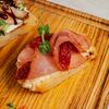 Брускетта с сыровяленой свининой, сливочным сыром и вялеными томатамив Лебовски Пицца и Боулинг по цене 250