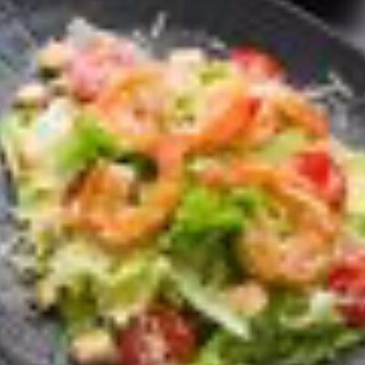 Салат Цезарь с креветками в Сушишоп по цене 440 ₽