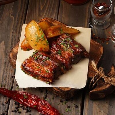 Свиные рёбрышки BBQ в Балкан Гриль Вкус Сербии по цене 950 ₽