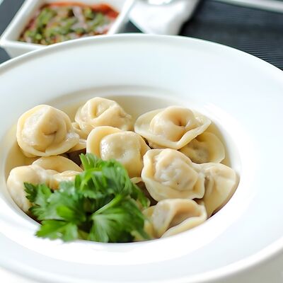 Пельмени с баранинойв Вятский чебурек по цене 450 ₽