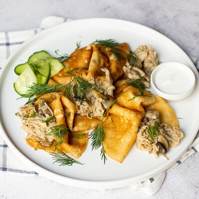 Блины с курицей и грибами в Traveler's coffee по цене 516 ₽