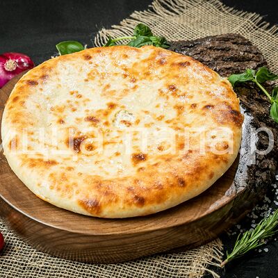 Осетинский пирог с курицей 28см в Пицца Пала по цене 650 ₽