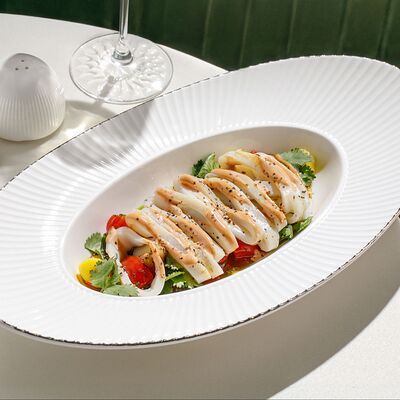 Салат с кальмаром и перцем рамиро на гриле в Cristal по цене 900 ₽