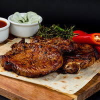 Стейк из свинины на кости в МАНГАЛКОФЕ