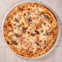 Карне на красном соусе в Adriano