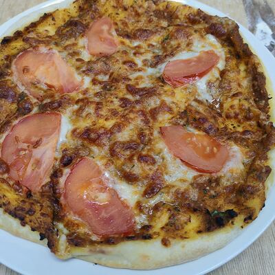 Хачапури по-мегрельски с томатами в Хинкали Домашние традиции по цене 720 ₽