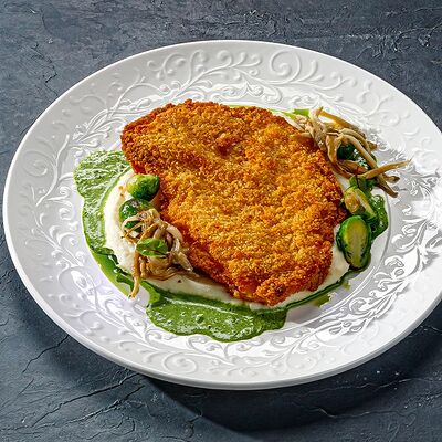 Шницель из куриного филе с картофельным пюре в Этажи по цене 560 ₽