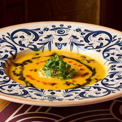 Крем-суп из тыквы со страчателлой из сулугуни в NANA Pirveli по цене 520 ₽