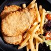 Куриный шницель с чесночным соусом и микс-салатом в Ньокки по цене 795