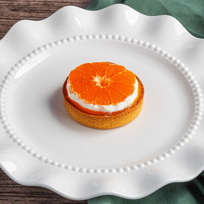 Мандариновый тарт в Morricone pizza & wine по цене 560 ₽