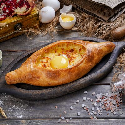 Хачапури по-аджарски в Эра Шашлыка по цене 715 ₽