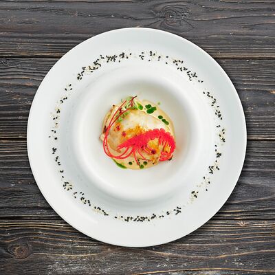 Фаршированный кальмар с ореховым соусом в Fermа по цене 1050 ₽