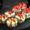 Запеченный фирменный Цунами ролл в Tsu-na-mi sushi&pizza по цене 470