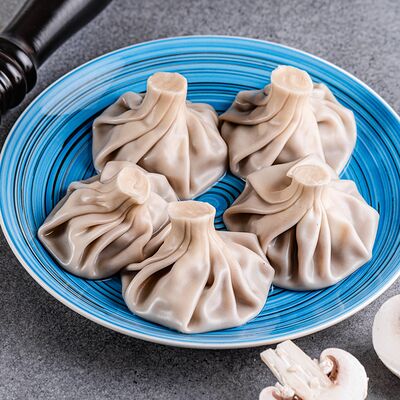 Хинкали с грибами в Три Кувшина по цене 550 ₽