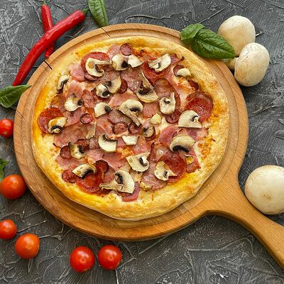 Мясная в Koodoo pizza & wok по цене 794 ₽