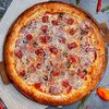 Пицца с Тунцом в La Pizza Bomba на дровах по цене 1190