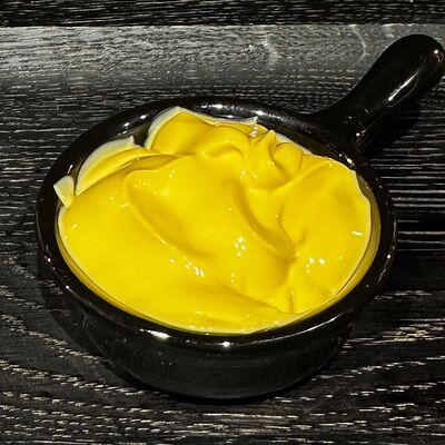 Соус Сырный в Amigoos по цене 90 ₽