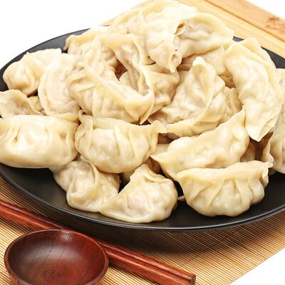 Варенные Пельмени с говядиной и соусом в iWok по цене 350 ₽