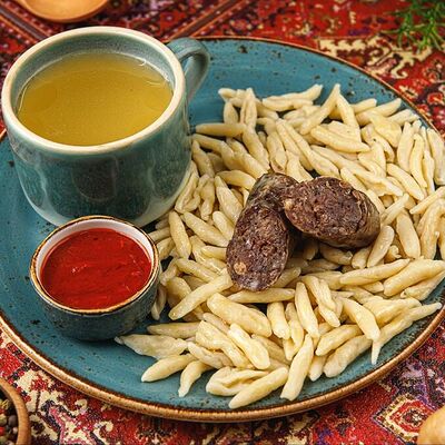 Жижиг-галнаш с сушеной колбасой в Юрта Дагестанская кухня по цене 970 ₽