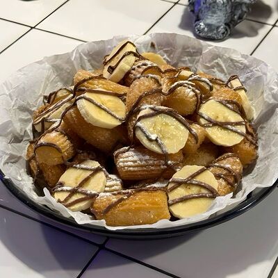 Чуррос с бананом и нутеллой в Такерия Dos Amigos по цене 350 ₽