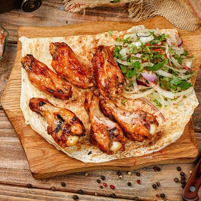 Куриные крылышки в Grill VIP House по цене 510 ₽