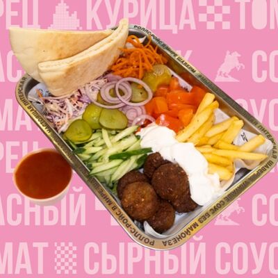 Шаверма на тарелке с фалафелем в ВЛАВАШЕ по цене 559 ₽