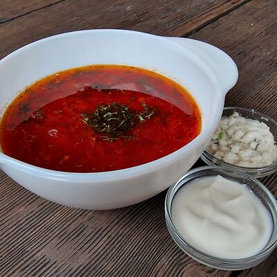 Борщ домашний с говядиной в Пельмэн по цене 235 ₽