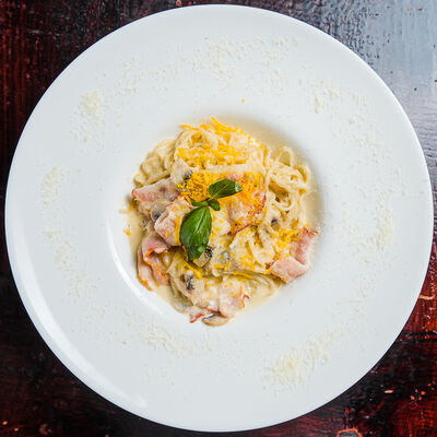 Паста Карбонара в Reader's pub по цене 340 ₽