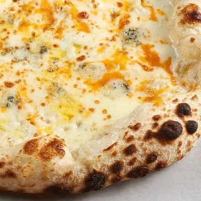 Пицца Четыре сыра в Brooklyn Pizza по цене 730 ₽