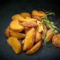 Картофельные дольки с розмарином в Bella Strada