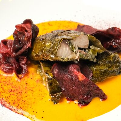 Филе скумбрии в виноградных листьях с облепиховым соусом и ягодной свеклой в Cafeshion по цене 680 ₽