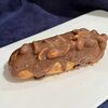 Шоколадный эклер с арахисомв Кафе сон у моря по цене 150