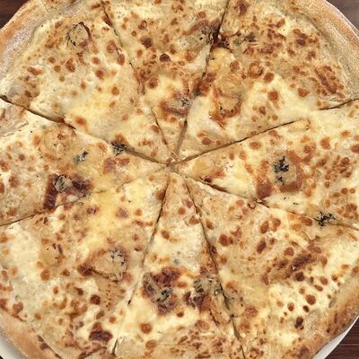 Пицца Четыре сыра в Рембрандт по цене 750 ₽