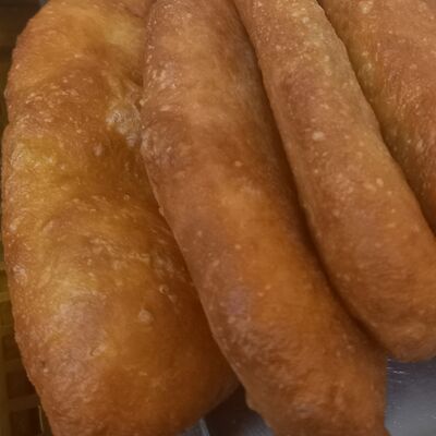 Пирожки с яйцом и зелёным лукомв Пончиковая по цене 135 ₽