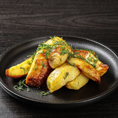 Картофель дольками запеченныйв Loca Pizza по цене 250 ₽