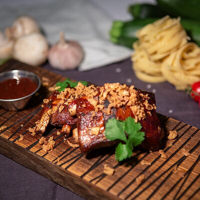 Свиные ребра барбекю в Гриль house по цене 510 ₽