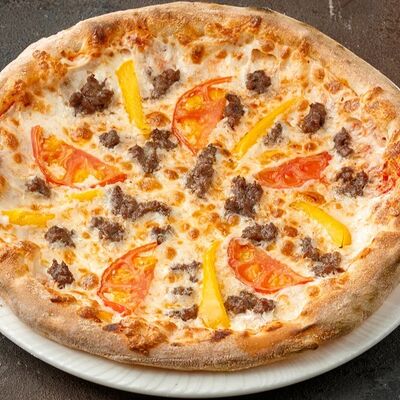 Пицца Мяснаяв Сеть Кафе Мангал по цене 500 ₽