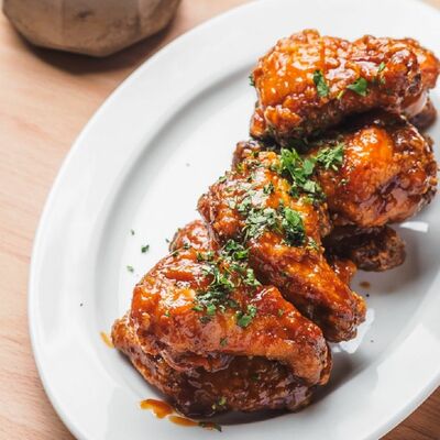 Крылышки арахисовые в Дафт паб по цене 410 ₽