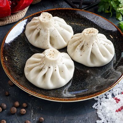 Хинкали с грибами в Чинтамани по цене 480 ₽