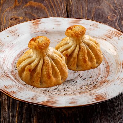 Хинкали с грибами жареныев У Ханумы по цене 240 ₽