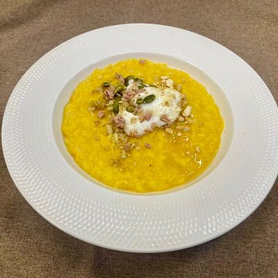 Рисовая каша с печеной тыквой, топленым молоком, медом и орехами в Bonjour Éléphant по цене 390 ₽
