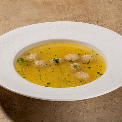 Куриный бульон с фрикадельками и птитимом в Cafe Sisi по цене 580 ₽