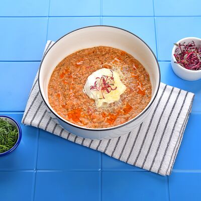 Каша томатная с яйцом пашот в Port-O-Coffee по цене 330 ₽