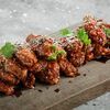 Половина хрустящих крыльев в соусе в Double Grill & Bar по цене 590