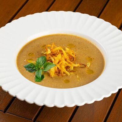 Крем-суп из белых грибов с картофельными чипсами в Shore House по цене 990 ₽