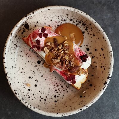 Запеканка с карамельным соусом и жареным миндалем в KOKK по цене 650 ₽