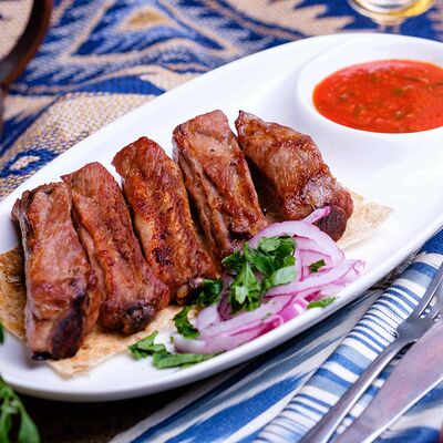 Свиные рёбрышки в Кафе кавказской кухни Хурма по цене 460 ₽